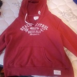 Red and white sweatshirt